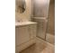 Bathroom vanity with a shower featuring sliding glass doors at 6176 S Adams Dr, Centennial, CO 80121