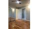 Cozy bedroom featuring hardwood floors and closet space at 6176 S Adams Dr, Centennial, CO 80121