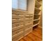 Bedroom featuring built-in dresser and shelving offering ample storage space at 6176 S Adams Dr, Centennial, CO 80121
