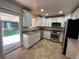 Charming kitchen with granite countertops and modern appliances at 6176 S Adams Dr, Centennial, CO 80121