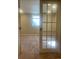 Office area featuring a glass paneled door, and a cozy carpet at 6176 S Adams Dr, Centennial, CO 80121