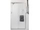 Updated bathroom shower with glass door and modern fixtures at 6842 W Eldorado Pl, Lakewood, CO 80227