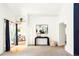 Bright entryway with modern decor, seamless access to the dining area, and ample natural light at 6842 W Eldorado Pl, Lakewood, CO 80227