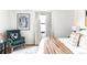 Bedroom featuring an accent chair and a large window with natural light at 6842 W Eldorado Pl, Lakewood, CO 80227