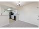 Bright, open dining area located adjacent to an updated kitchen at 942 S Walden St # 206, Aurora, CO 80017