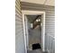 View of the entryway, with a staircase leading to the upper level, through the open front door at 942 S Walden St # 206, Aurora, CO 80017