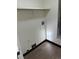 Small laundry room with washer hookups and shelving at 942 S Walden St # 206, Aurora, CO 80017