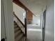 Inviting living room with fireplace, exposed beams, and neutral carpet at 942 S Walden St # 206, Aurora, CO 80017