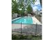 Community pool with privacy fence at 942 S Walden St # 206, Aurora, CO 80017