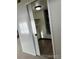 Room featuring neutral-toned walls and laminate flooring at 942 S Walden St # 206, Aurora, CO 80017