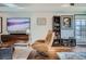 Cozy living room showcasing hardwood floors, stylish furnishings, and artistic decor at 925 N Lincoln St # 8E-S, Denver, CO 80203