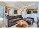 Comfortable living room area featuring modern furnishings and hardwood flooring at 925 N Lincoln St # 8E-S, Denver, CO 80203