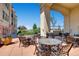Inviting outdoor patio with tables and chairs, perfect for entertaining or enjoying al fresco dining at 925 N Lincoln St # 8E-S, Denver, CO 80203