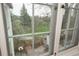 Backyard view from a large window shows a manicured lawn and landscape and stone patio area at 844 N Humboldt St # 5, Denver, CO 80218