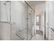 Bathroom with glass enclosed shower and tiled walls at 844 N Humboldt St # 5, Denver, CO 80218