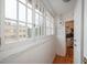 Hallway with view of kitchen features natural lighting and hardwood floors at 844 N Humboldt St # 5, Denver, CO 80218