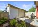 Cozy back patio with BBQ, table, and garden at 2004 Foxtail Ln # B, Lafayette, CO 80026