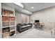 Finished basement with cozy seating area, a desk, and natural light at 2004 Foxtail Ln # B, Lafayette, CO 80026