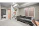 Finished basement with a cozy seating area, desk, and access to bedroom at 2004 Foxtail Ln # B, Lafayette, CO 80026