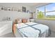 Bright bedroom with natural light, modern decor, and neutral tones create a cozy and inviting space at 2004 Foxtail Ln # B, Lafayette, CO 80026