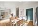 Well-lit dining area showcases a wooden table with seating and natural light at 2004 Foxtail Ln # B, Lafayette, CO 80026