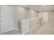 Hallway showcasing neutral carpet, a staircase, white trim, and recessed lighting at 13477 Valentia St, Thornton, CO 80602