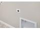 A close-up of a wall with a electrical outlet and a box at 13477 Valentia St, Thornton, CO 80602