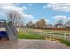 Backyard featuring a patio, stairs to deck, new fence, and lawn at 6227 Shenandoah Ave, Firestone, CO 80504