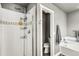 Shower and bath tub with modern fixtures and tile at 6227 Shenandoah Ave, Firestone, CO 80504