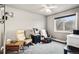 Bedroom with neutral walls, ceiling fan, window at 6227 Shenandoah Ave, Firestone, CO 80504