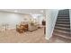 Cozy living room with neutral decor, carpeted floors, and a comfortable sofa at 806 S Jersey St, Denver, CO 80224