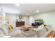 Spacious living area with large sectional, stylish decor, and plenty of room to relax and unwind at 806 S Jersey St, Denver, CO 80224