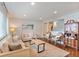 Comfortable living room with hardwood floors, neutral color scheme, and stylish furnishings and decor at 806 S Jersey St, Denver, CO 80224