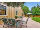 Outdoor patio with a table and chairs, perfect for entertaining or enjoying a meal outside at 8845 W 81St Dr, Arvada, CO 80005