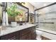 Bathroom featuring granite countertop, undermount sink, shower/tub combination at 2140 Torrey Pine Dr, Evergreen, CO 80439