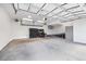 Spacious garage with high ceilings and plenty of room for storage and a workshop at 2140 Torrey Pine Dr, Evergreen, CO 80439