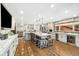 Spacious kitchen with a granite island, stainless appliances, hardwood floors, and lots of cabinet space at 2140 Torrey Pine Dr, Evergreen, CO 80439