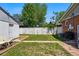 Backyard includes detached garage, stone patio and grassy area at 3437 W 35Th Ave, Denver, CO 80211