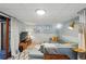 Finished basement with stylish sectional sofa, modern decor, and ample space at 3437 W 35Th Ave, Denver, CO 80211