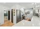 Bright, updated kitchen with stainless appliances and white quartz countertops at 3437 W 35Th Ave, Denver, CO 80211