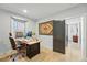 Bright home office with hardwood floors, large desk, and decorative rug at 3437 W 35Th Ave, Denver, CO 80211