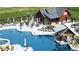 Community pool with seating and tables, perfect for relaxation and socializing at 1800 Vantage Pkwy, Berthoud, CO 80513