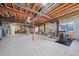 Spacious unfinished basement featuring concrete floor and ceiling, exposed ductwork and unfinished walls at 3104 Newport Cir, Castle Rock, CO 80104