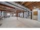 Unfinished basement featuring concrete floor and ceiling, exposed ductwork, and utility connections at 3104 Newport Cir, Castle Rock, CO 80104