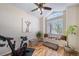 Bright exercise room with large window and window seat at 3104 Newport Cir, Castle Rock, CO 80104