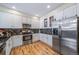 Modern kitchen with stainless steel appliances, granite countertops, and lots of cabinet space at 3104 Newport Cir, Castle Rock, CO 80104