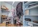 Organized walk-in closet with built-in shelving and ample storage space for clothes and shoes at 3104 Newport Cir, Castle Rock, CO 80104