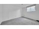 Unfinished basement bedroom with neutral carpeting at 10321 E Evans Se Ave # 176, Aurora, CO 80247