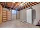 Unfinished basement area with storage shelving at 10321 E Evans Se Ave # 176, Aurora, CO 80247