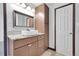 Bathroom with modern vanity, vessel sink, and ample storage at 10321 E Evans Se Ave # 176, Aurora, CO 80247